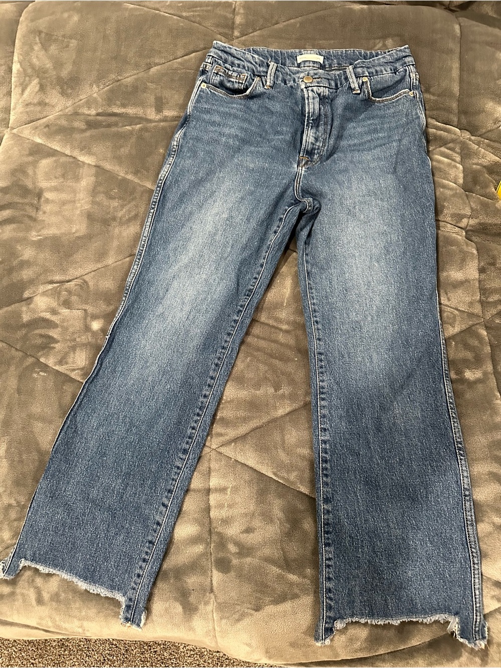Good American Light Blue Flare Jeans with Frayed Hem